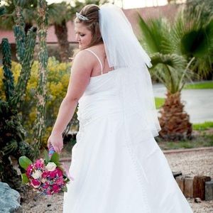 Wedding dress. Size 22. Worn once. Dry cleaned. Preserved